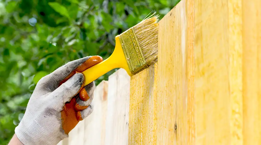 Painting a wood fence